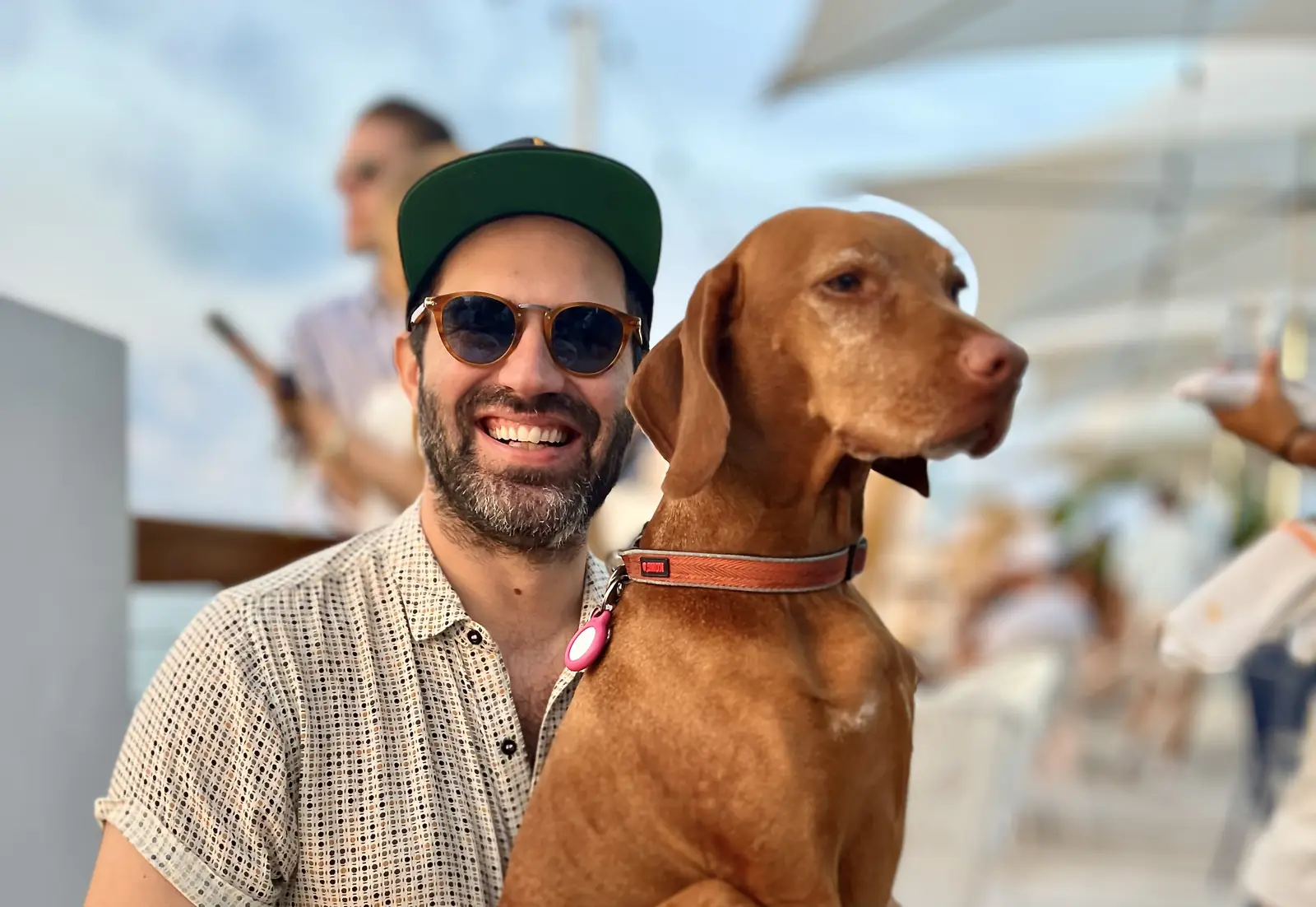 Michael Maitlen outdoors with Millie, his Vizsla.